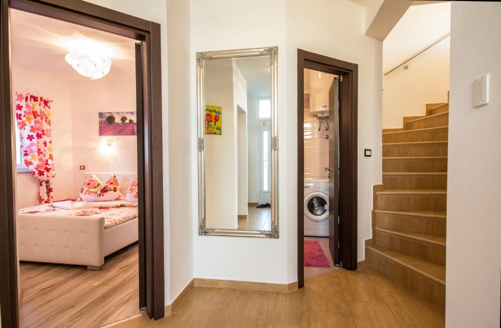 Łóżko lub łóżka w pokoju w obiekcie Villa Brcina