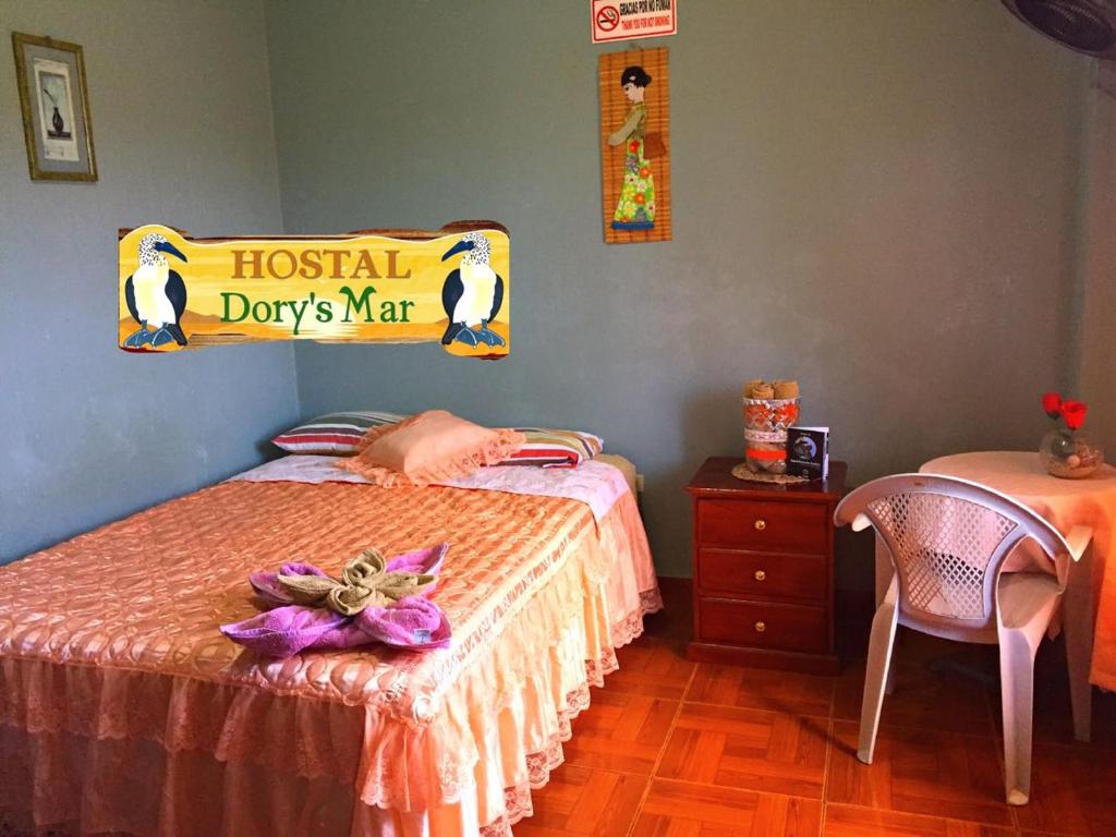 Postel nebo postele na pokoji v ubytování Hostal Dorys Mar