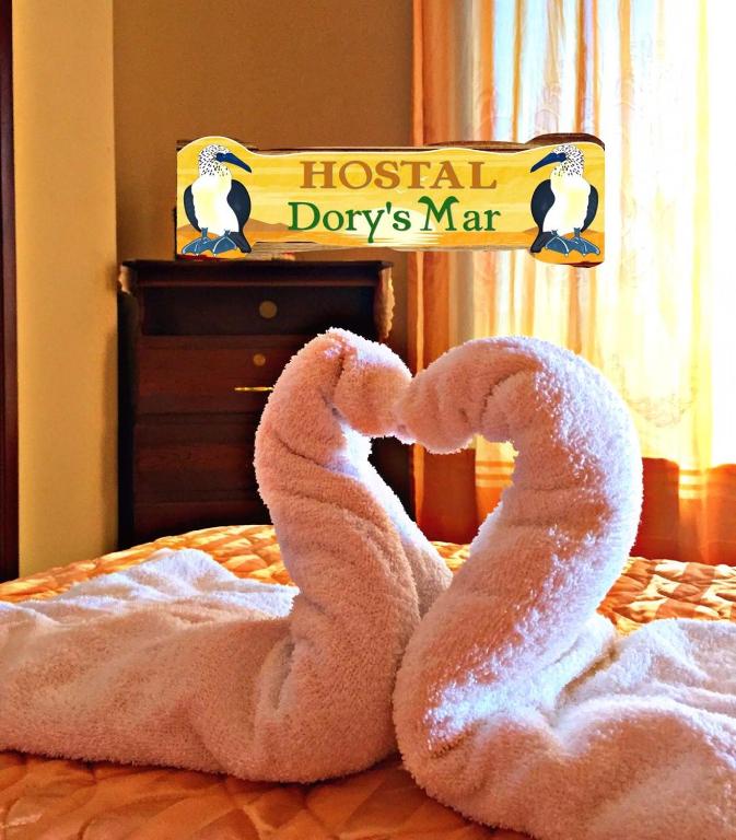 Postel nebo postele na pokoji v ubytování Hostal Dorys Mar