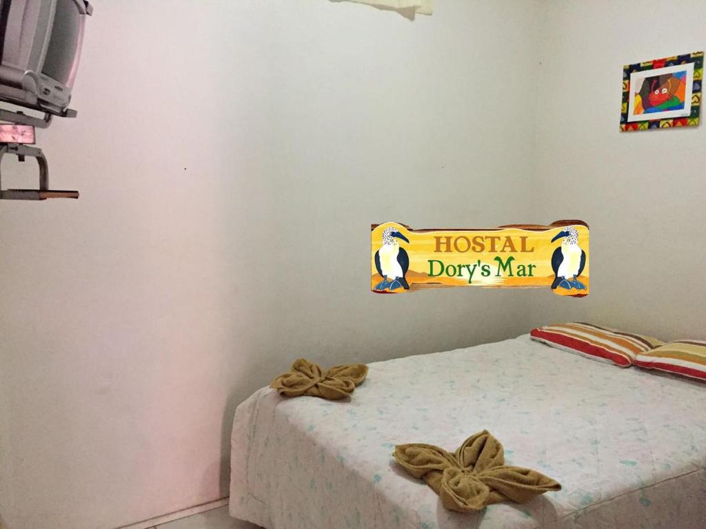 Postel nebo postele na pokoji v ubytování Hostal Dorys Mar