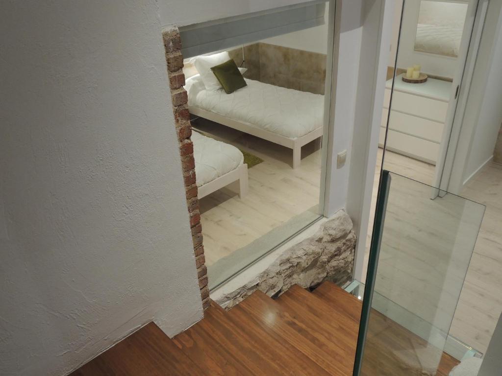 Posteľ alebo postele v izbe v ubytovaní Apartamento Ribera Del Puente