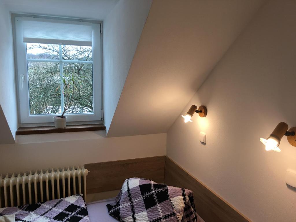 Postel nebo postele na pokoji v ubytování Penzion 103