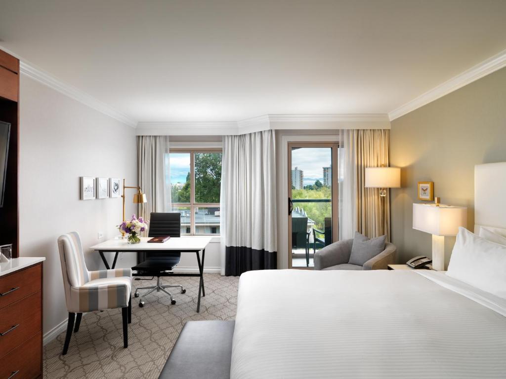 Postel nebo postele na pokoji v ubytování Hotel Grand Pacific