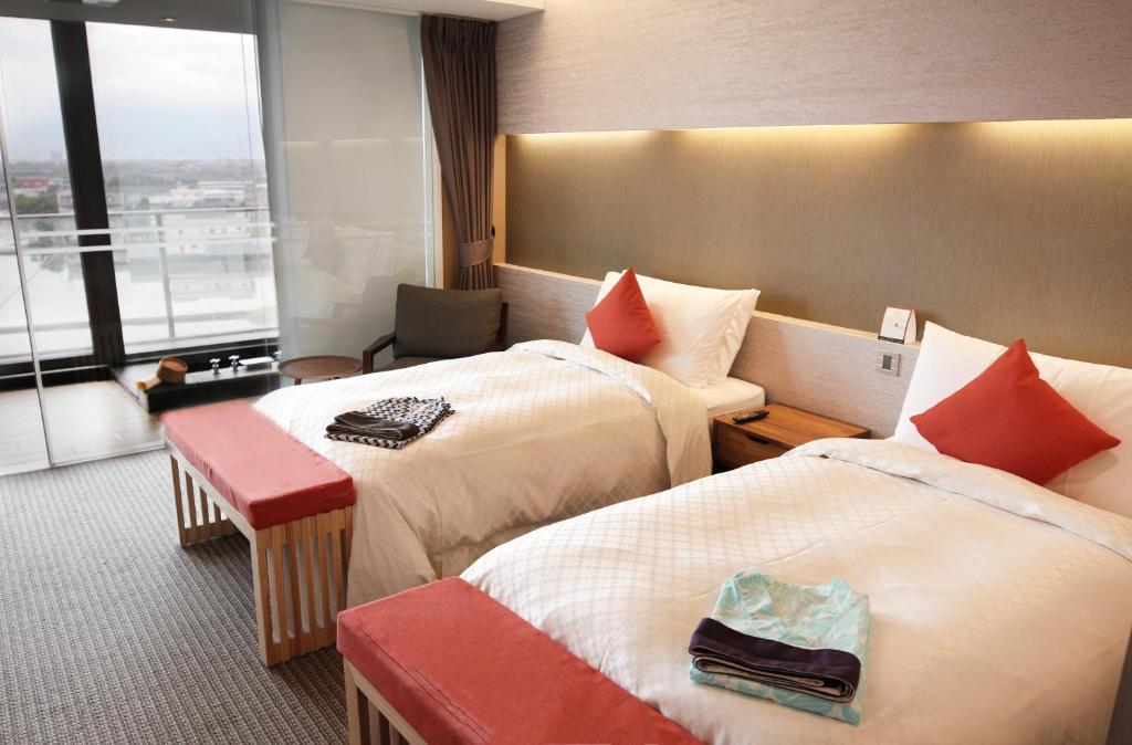 Letto o letti in una camera di Dancewoods Hotel