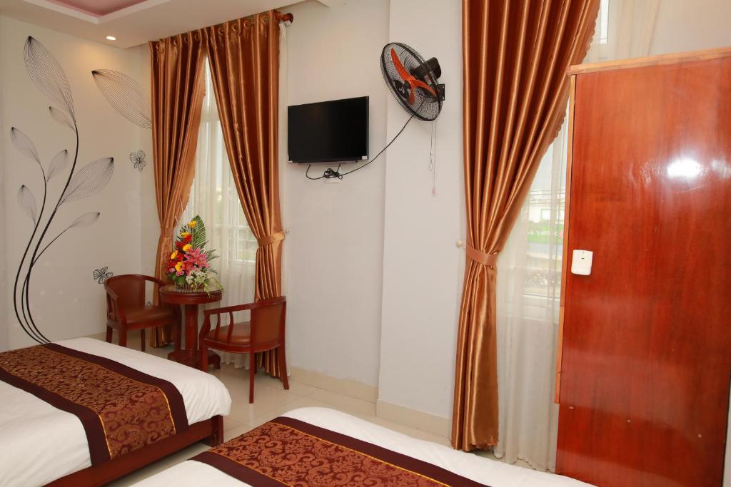TV a/nebo společenská místnost v ubytování Cong Thuong Hotel