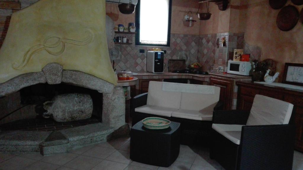 Posezení v ubytování B&b Su Acu