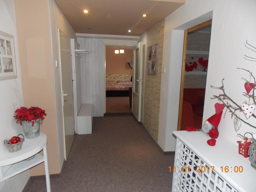 Postel nebo postele na pokoji v ubytování Apartman JaS