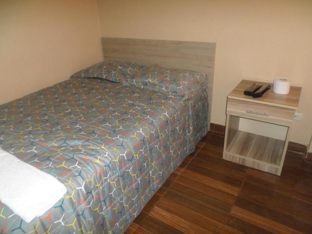 Postel nebo postele na pokoji v ubytování D' Barrig