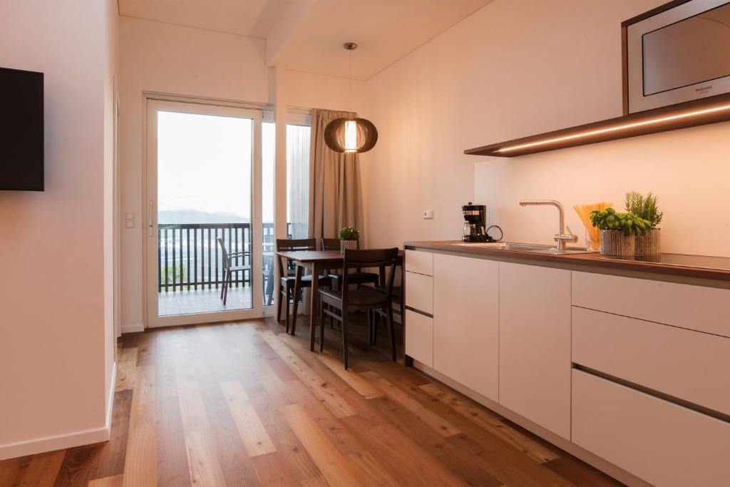 Kuchyň nebo kuchyňský kout v ubytování Apparthotel Calma