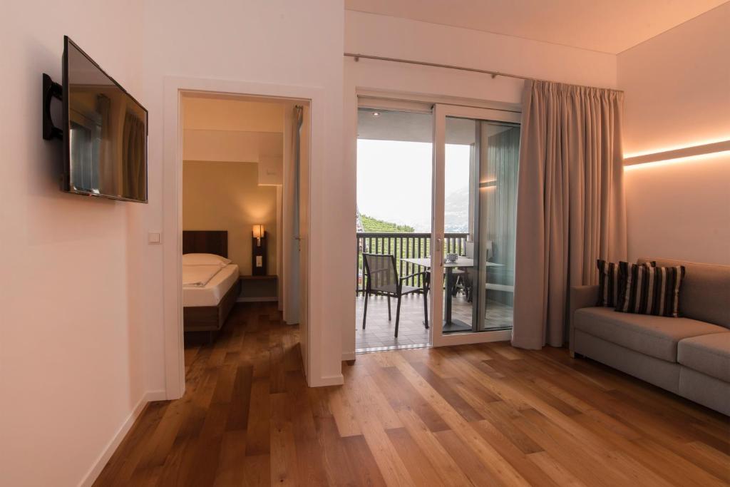 Postel nebo postele na pokoji v ubytování Apparthotel Calma