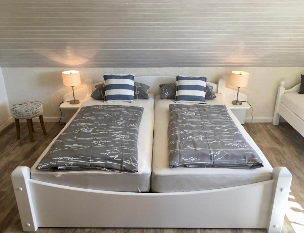 Postel nebo postele na pokoji v ubytování Appartements Friedrichsen