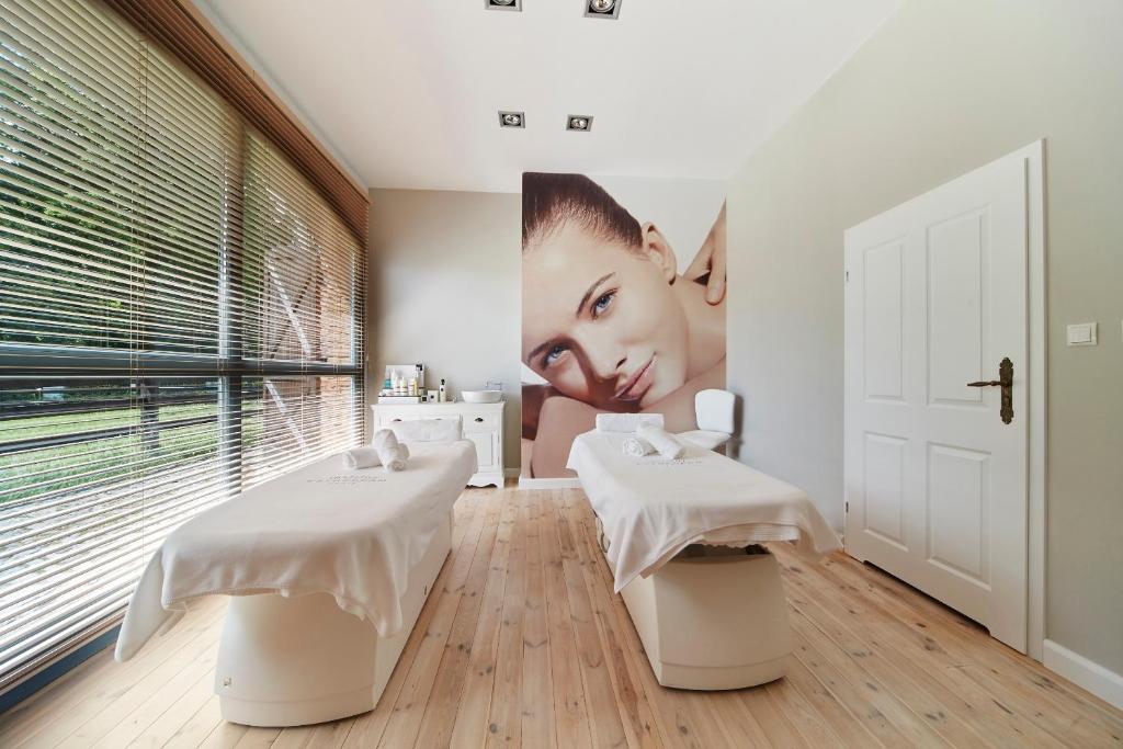 Posteľ alebo postele v izbe v ubytovaní Pałac Ciekocinko Hotel Resort & Wellness