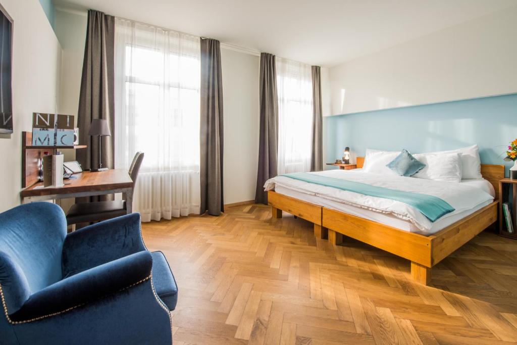 Llit o llits en una habitació de Boutique Hotel NI-MO