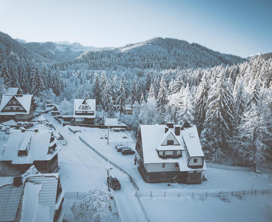 Pokoje i Apartamenty Nad Potokiem v zime