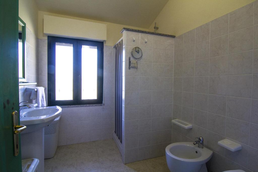 Koupelna v ubytování Agriturismo Sa Rocca