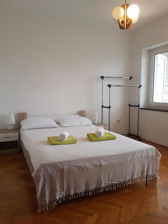 Posteľ alebo postele v izbe v ubytovaní Barun apartments Kastela