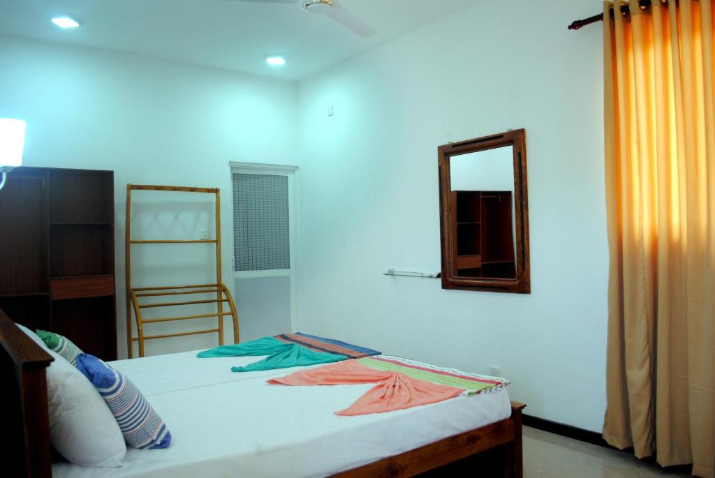 Uma cama ou camas num quarto em Village Villa