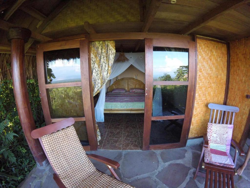Balkón nebo terasa v ubytování Rinjani Mountain Garden
