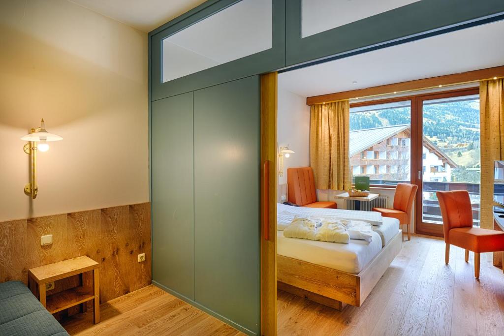 Posteľ alebo postele v izbe v ubytovaní Hotel NockResort