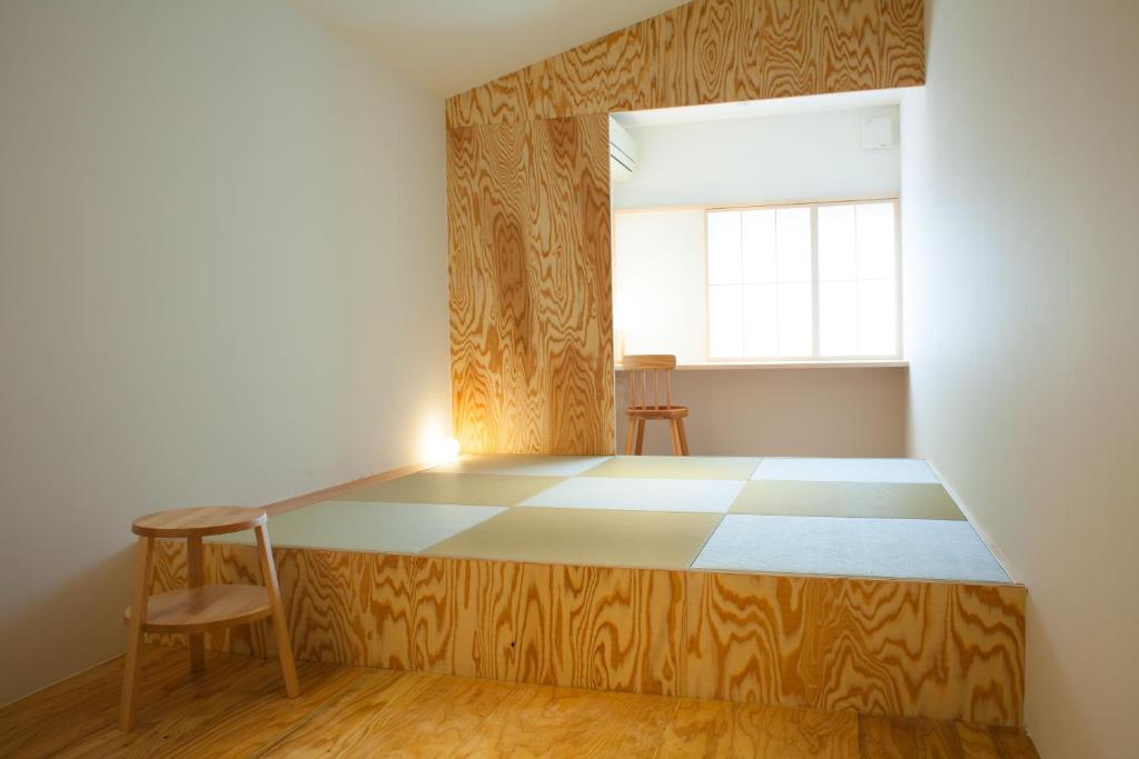 Postel nebo postele na pokoji v ubytování Kinsui Annex