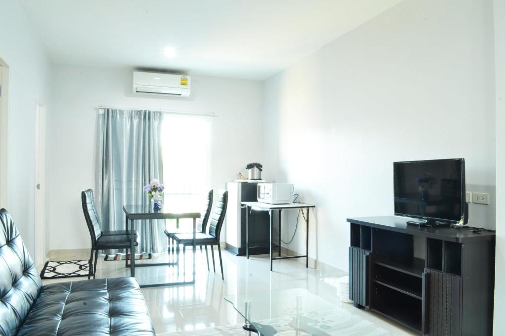 TV a/nebo společenská místnost v ubytování Connect Apartment