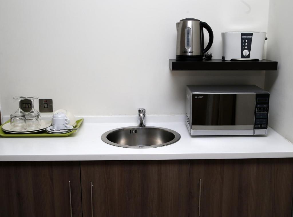 Dapur atau dapur kecil di Rawda Hotel