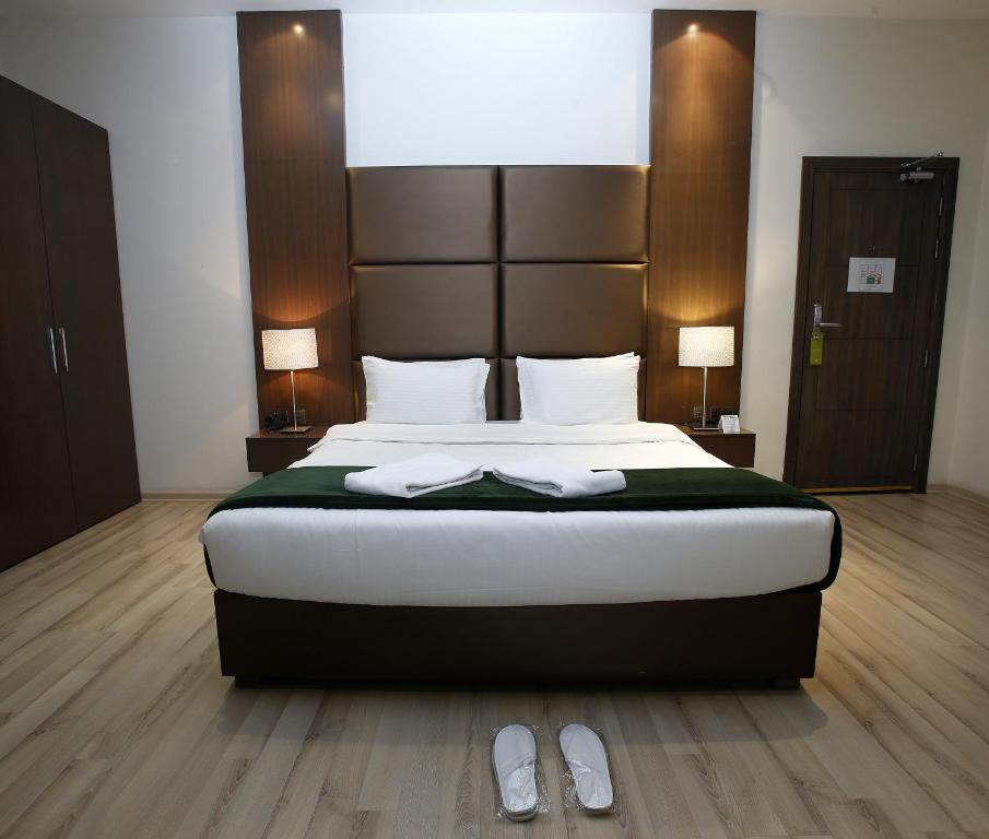 Katil atau katil-katil dalam bilik di Rawda Hotel