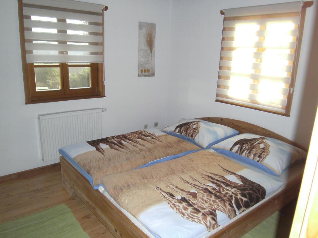 Posteľ alebo postele v izbe v ubytovaní Blockhaus Familie Raidl
