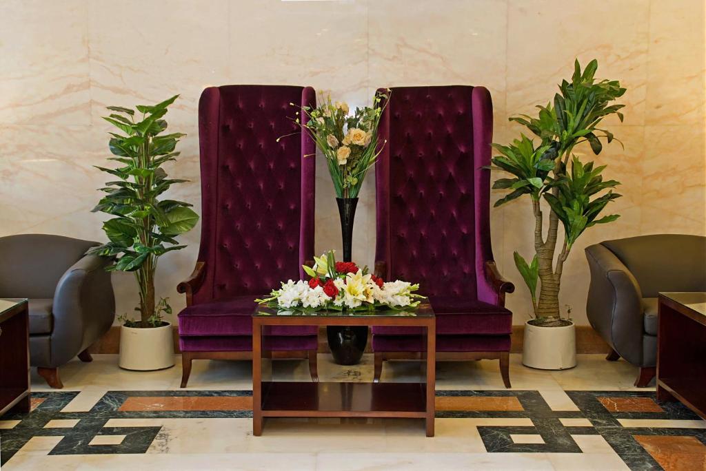 Posezení v ubytování Emaar Royal Hotel