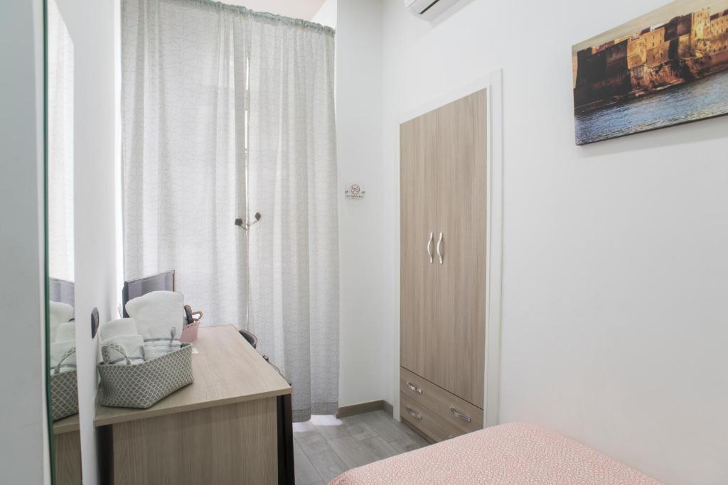 A bed or beds in a room at La Casa di Luna