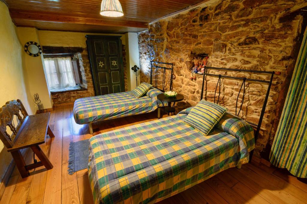 Posteľ alebo postele v izbe v ubytovaní Casa do Eiró