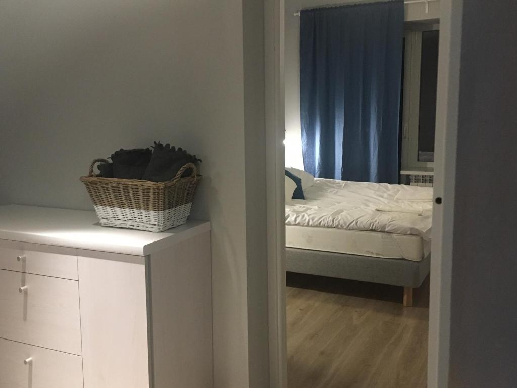 Postel nebo postele na pokoji v ubytování Kwiatowa6 Apartamenty Szczawnica
