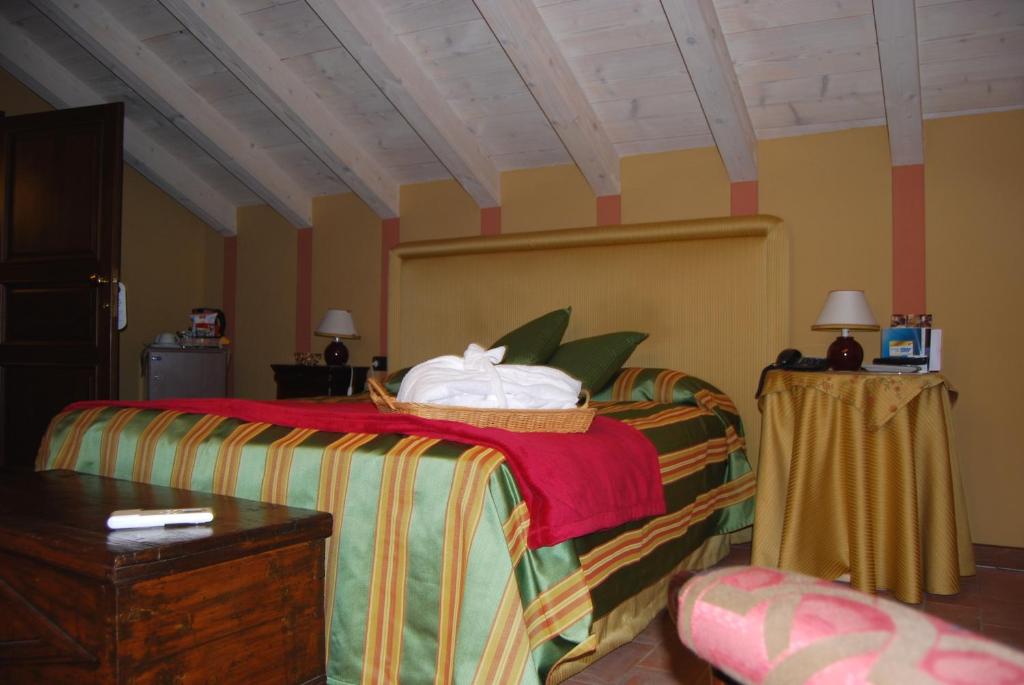 Posteľ alebo postele v izbe v ubytovaní Hotel Locanda Da Carla