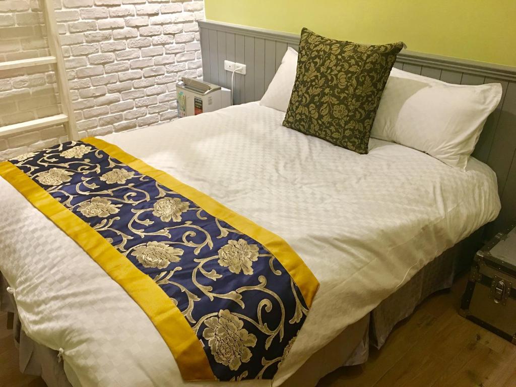 Postel nebo postele na pokoji v ubytování Luck Homestay