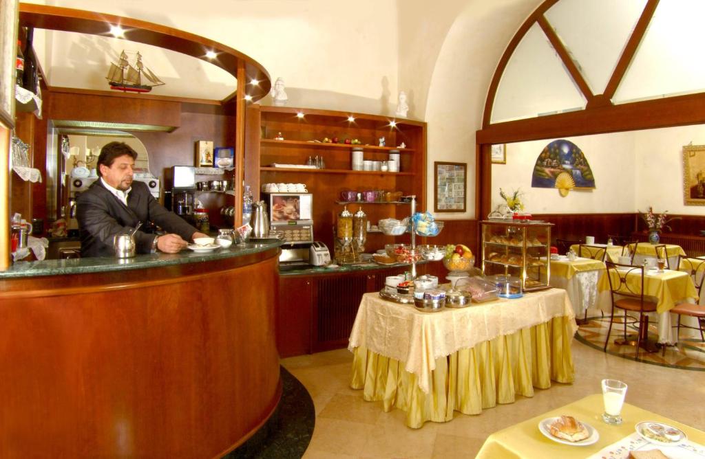Nápoje v ubytování Hotel Assisi
