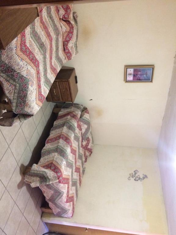 Postel nebo postele na pokoji v ubytování Blanquita Apartment