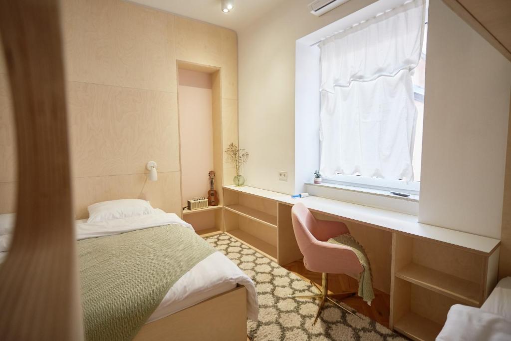 Postel nebo postele na pokoji v ubytování Isabella Living