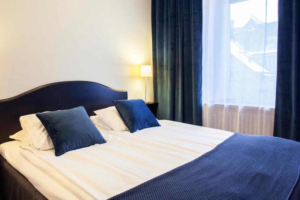 Postel nebo postele na pokoji v ubytování Best Western Hotel Trollhattan