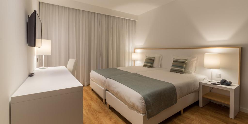 Postel nebo postele na pokoji v ubytování Steyler Fatima Hotel & Congress