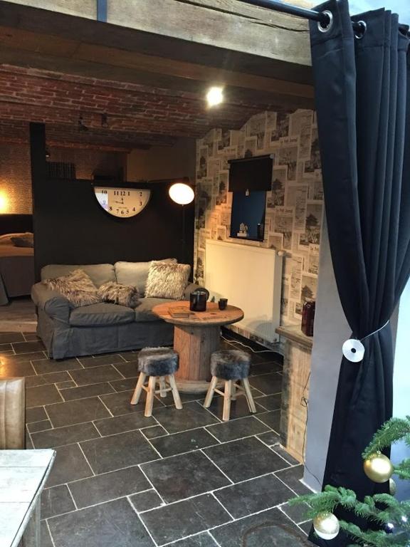 Posezení v ubytování Gîte de Corbion loft2