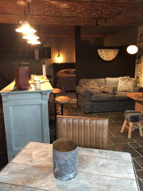 Posezení v ubytování Gîte de Corbion loft2
