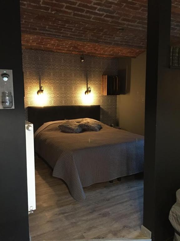 Postel nebo postele na pokoji v ubytování Gîte de Corbion loft2