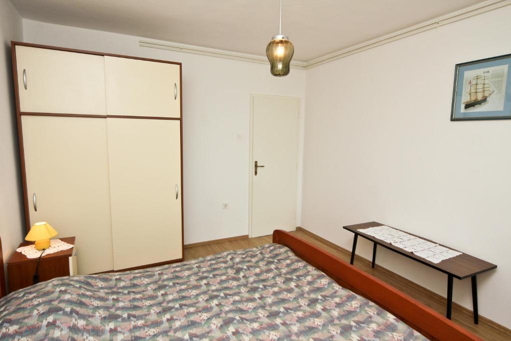 Posteľ alebo postele v izbe v ubytovaní Apartments Ivanko