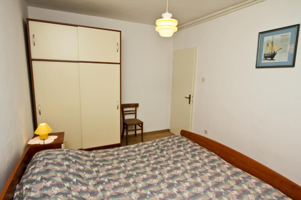Posteľ alebo postele v izbe v ubytovaní Apartments Ivanko