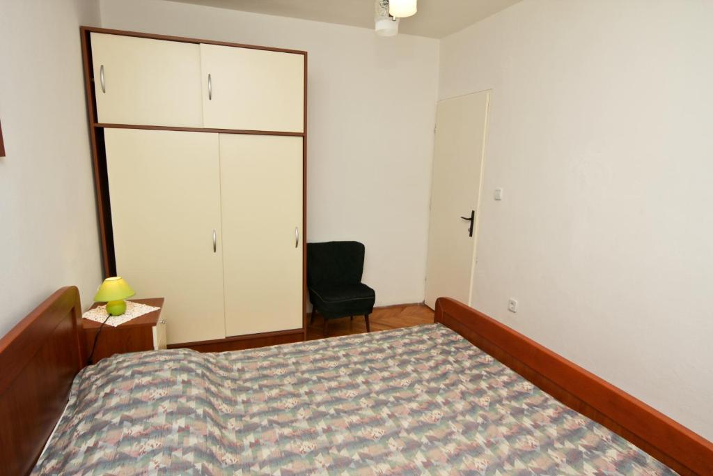 Posteľ alebo postele v izbe v ubytovaní Apartments Ivanko