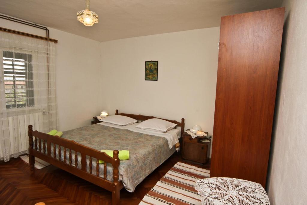 Posteľ alebo postele v izbe v ubytovaní Apartments Ivanko