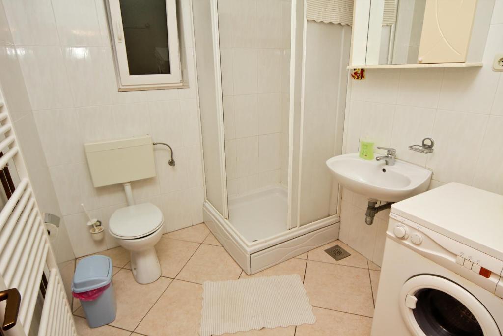 Kúpeľňa v ubytovaní Apartments Ivanko