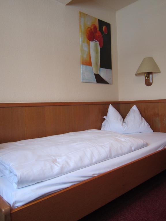 Postel nebo postele na pokoji v ubytování Gasthaus Neupert