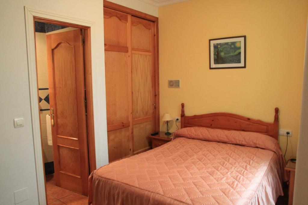 Postel nebo postele na pokoji v ubytování Hostal Ana - Adults Recommended