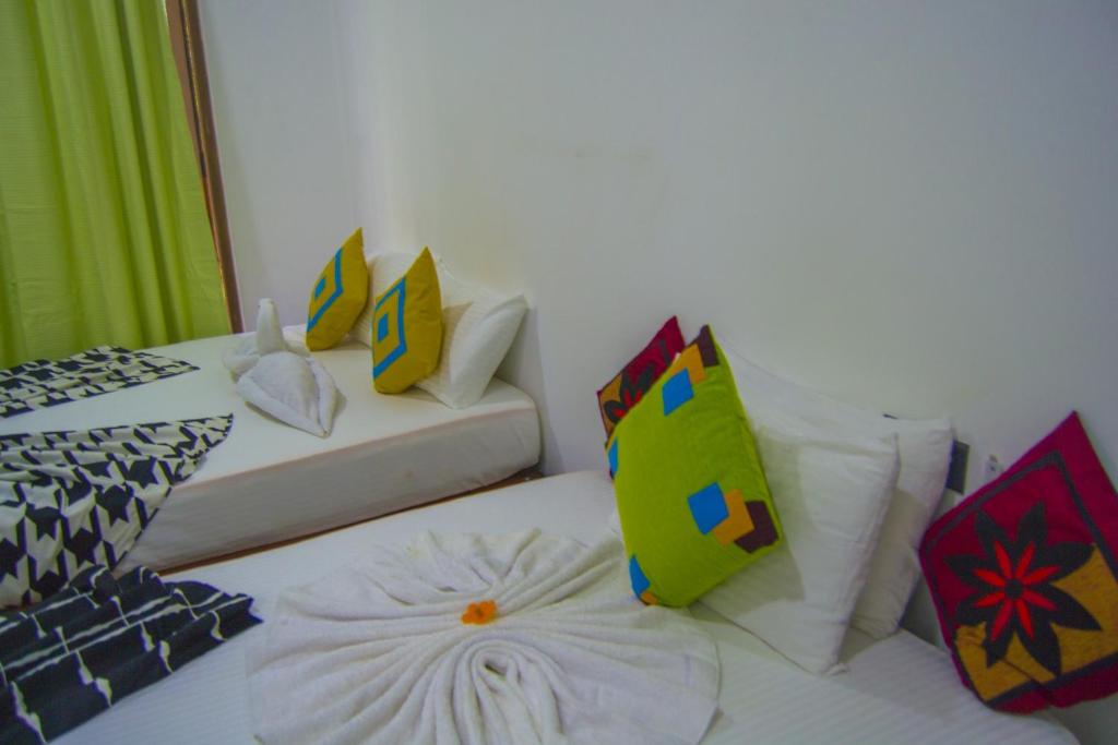 Postel nebo postele na pokoji v ubytování girilena resort